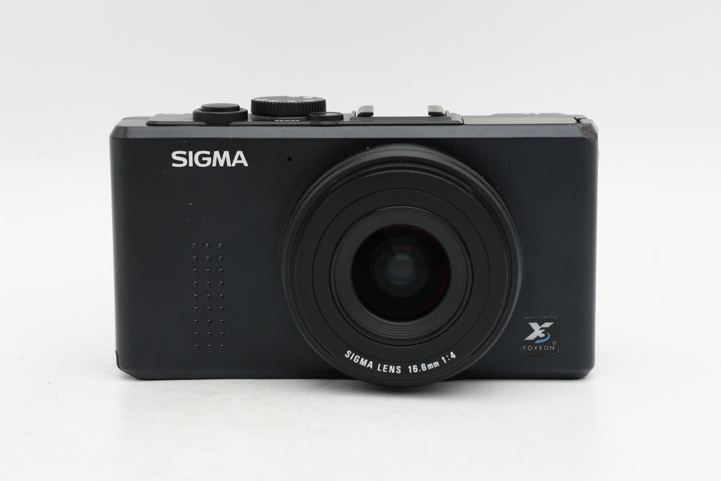 Used Sigma DP1S (Fair) Dent on Top Corner