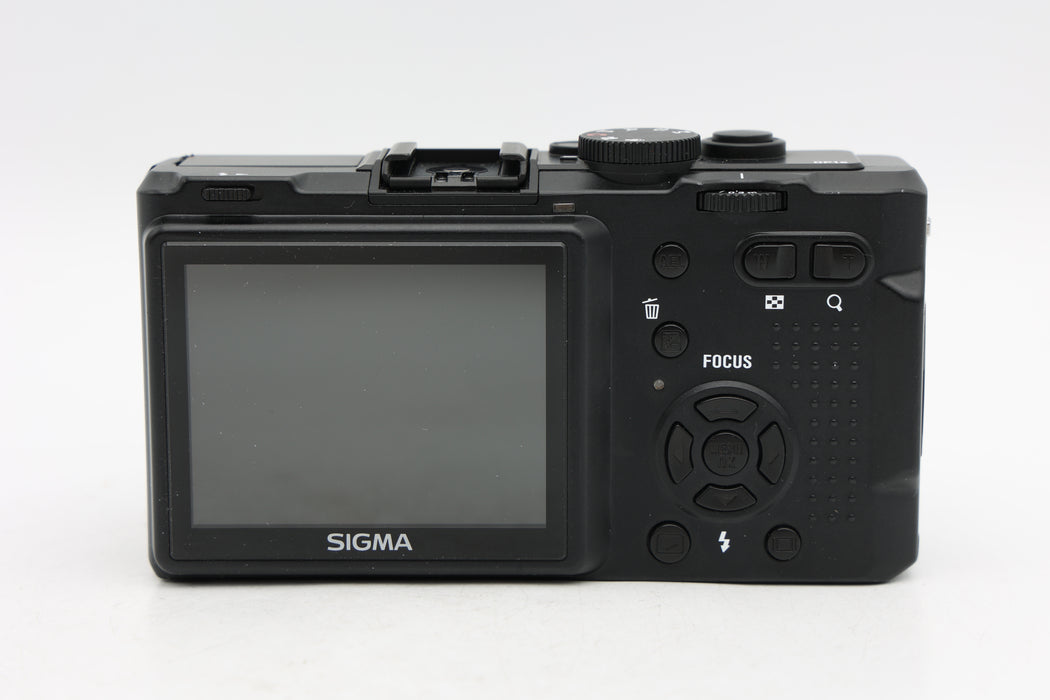 Used Sigma DP1S (Fair) Dent on Top Corner
