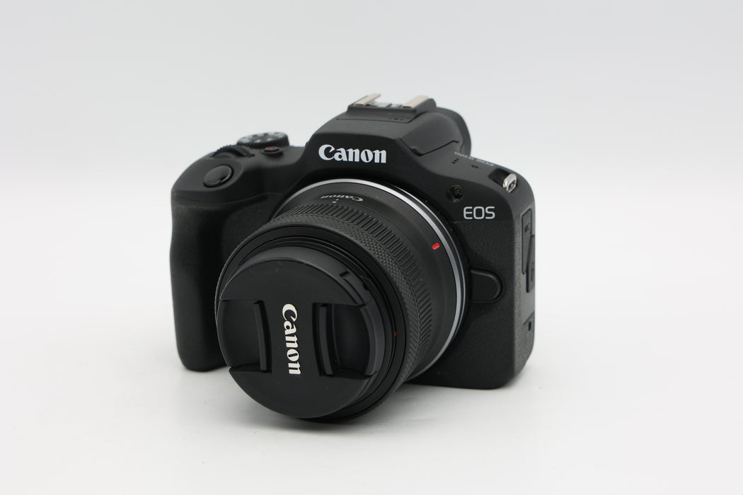 Used Canon R100 W/18-45mm IS (EX)