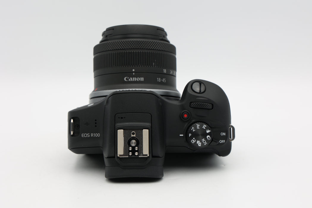 Used Canon R100 W/18-45mm IS (EX)
